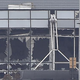 The damaged facade of a building at Brussels Airport after at least 26 people were killed and many more injured as blasts rocked the main terminal of the airport as well as a metro station in Brussels on March 22, 2016
JOHN THYS/AFP/Getty Images